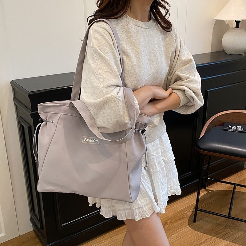 Borsa a tracolla in tessuto di nylon versatile, grande capacità, 2025, per la classe e per gli spostamenti quotidiani_voghion.com