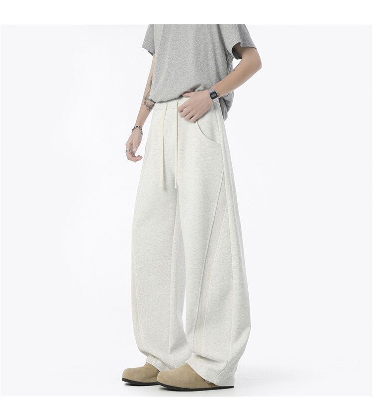 Jogginghose im dekonstruierten, einfarbigen Herrenstil – Cleanfit, lockere, gerade geschnittene Freizeit-Sweathose für Streetwear und den Alltag_voghion.com
