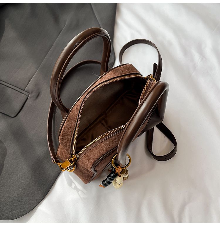 Zaino retrò in pelle scamosciata per donna 2025, nuovo zaino alla moda e alla moda con piccola catena di fragranze, borsa a secchiello multifunzionale_voghion.com