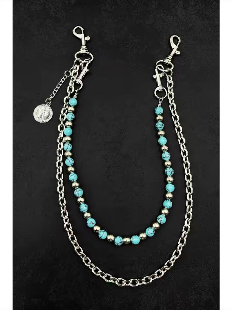 Pantalon en perles turquoise fait main, fond bleu, motif noir, chaîne de taille détachable sur un seul côté, artisanat lourd_voghion.com