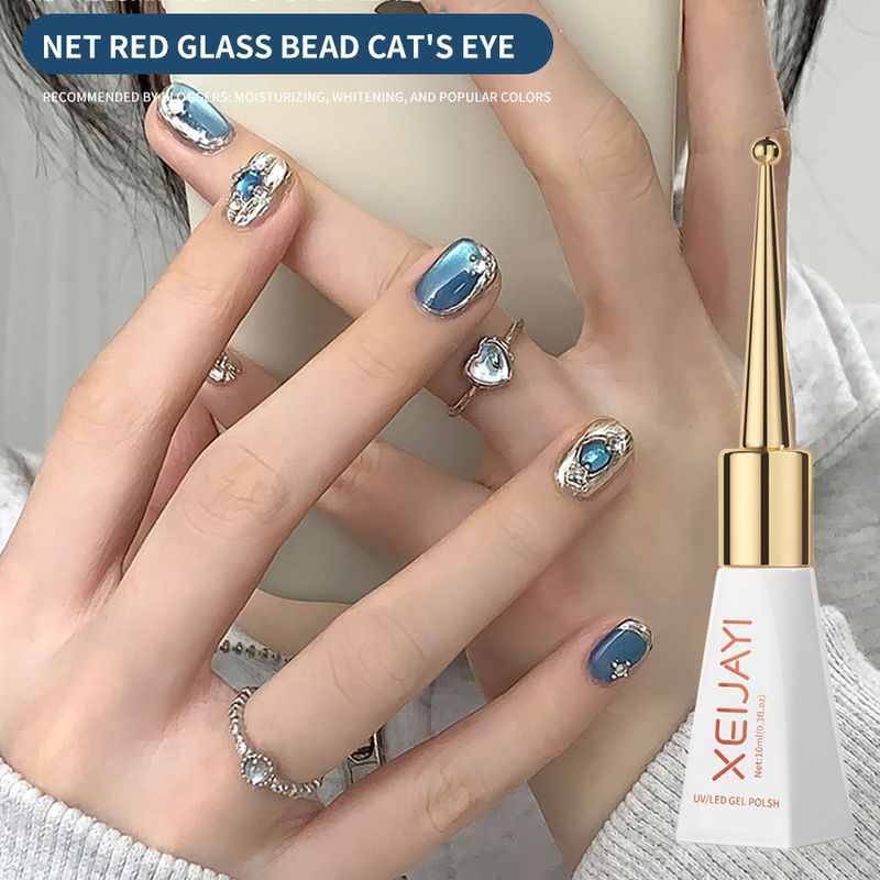 Nail Art & Tools Smalto per unghie in porcellana bianca con perline di vetro effetto occhio di gatto, nuovo autunno e inverno, popolare smalto per unghie effetto occhio di gatto bianco chiaro di luna, uso in salone_voghion.com