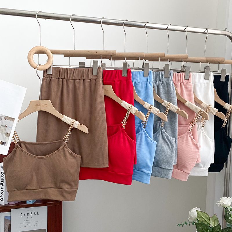 Set due pezzi con canotta corta a catena sexy da donna, gonna aderente a vita alta e gonna a vita alta_voghion.com