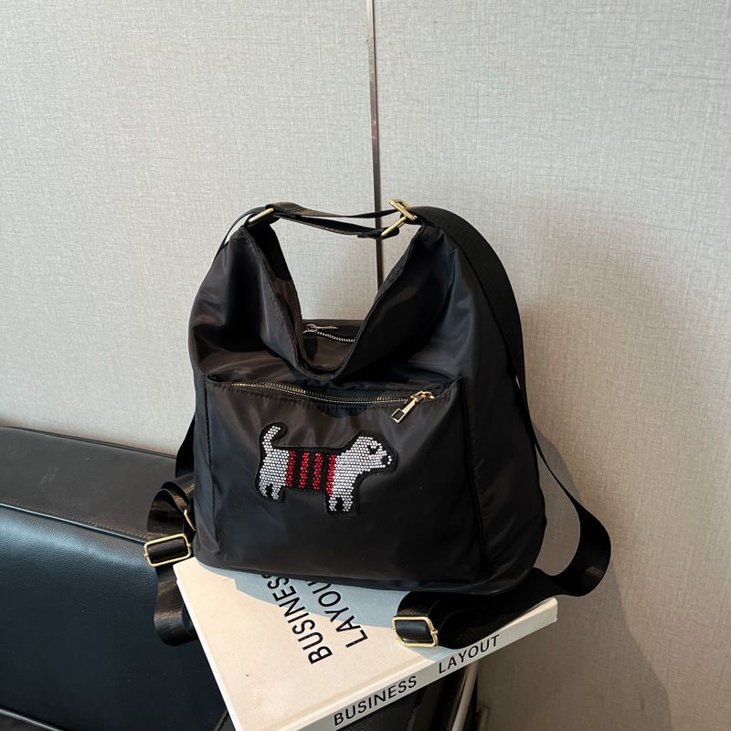 Borsa a tracolla multiuso in stile coreano INS per ragazze, 2025, nuova borsa a tracolla con cucciolo di cartone animato, grande capacità, zaino versatile_voghion.com