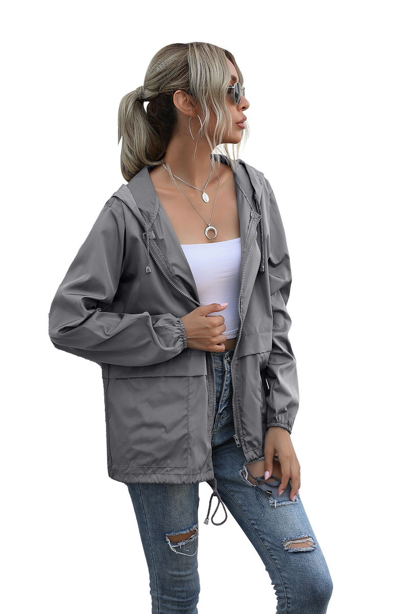 Chaqueta impermeable ligera con capucha y cremallera para mujer para senderismo al aire libre, disponible en stock_voghion.com