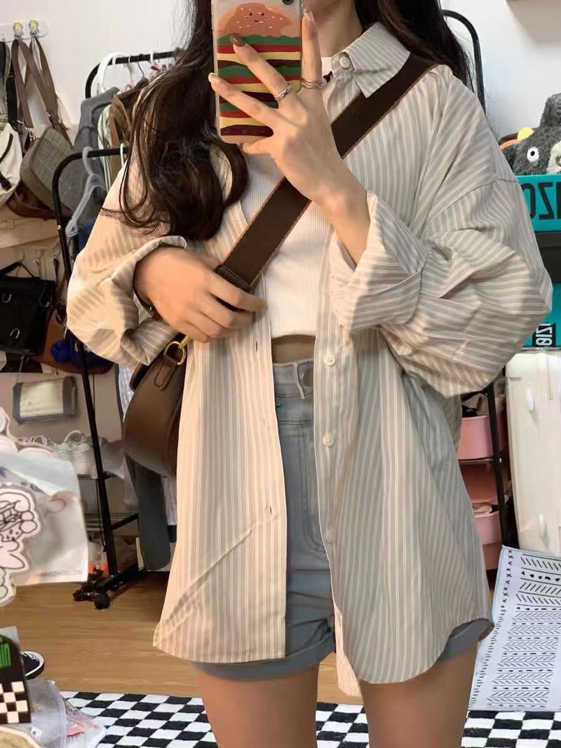Zonnebrand gestreepte top voor dames in de lente en zomer van 2024, nieuw college-stijl Frans design, losvallend overhemdjack_voghion.com