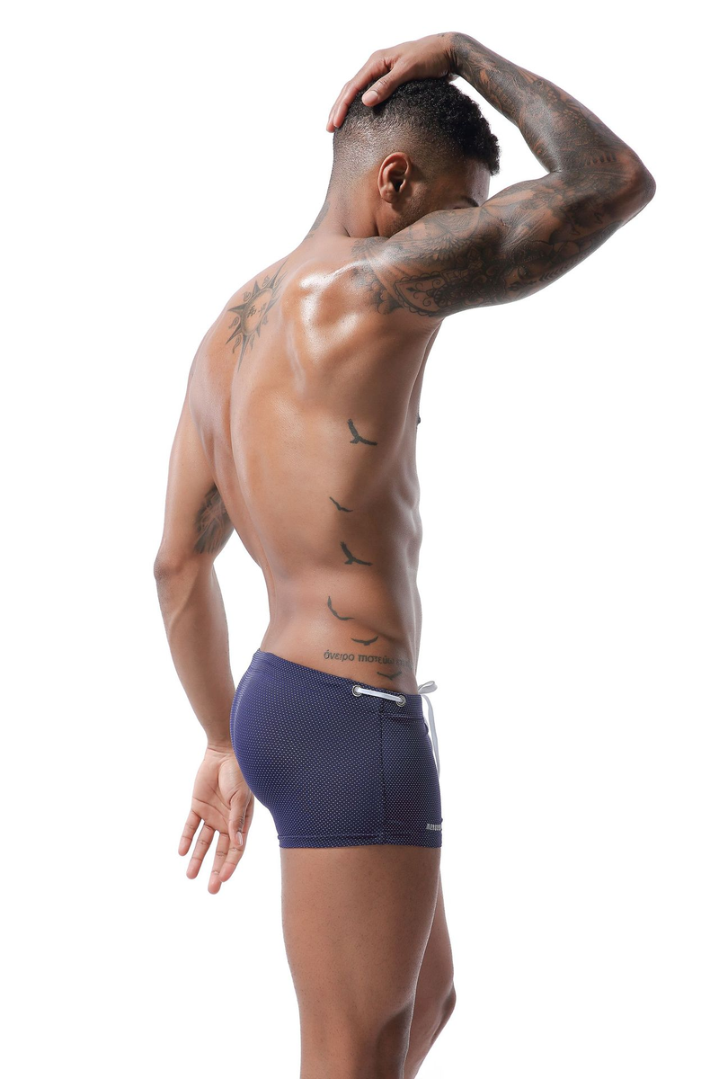 Venta al por mayor de bañadores de verano para hombre, de nailon, con cintura baja y ángulo plano, para exportación._voghion.com