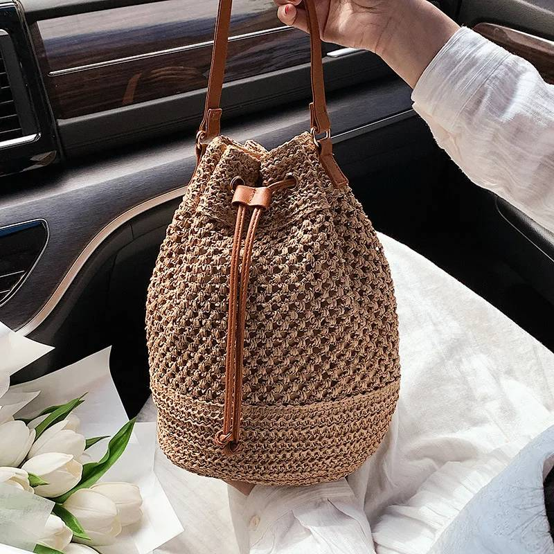 Secchiello di paglia intrecciata estiva per le donne Borsa a tracolla con coulisse semplice Borsa da spiaggia da viaggio Borsa a mano casual intrecciata_voghion.com