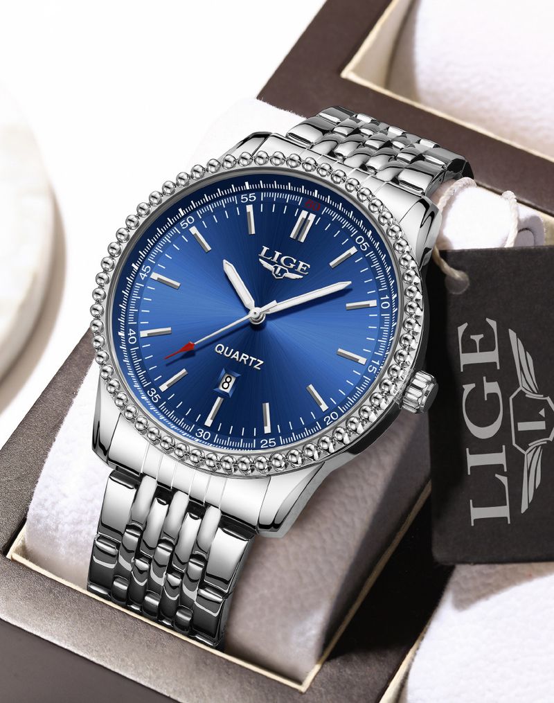 Herenhorloge van roestvrij staal met datumweergave, waterbestendig, lichtgevende wijzers en een zakelijke kalender in casual stijl._voghion.com