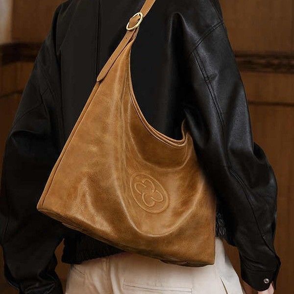 Borsa a secchiello triangolare Lisidanni da donna, borsa tote monospalla in pelle conciata al vegetale Niche Kasle_voghion.com