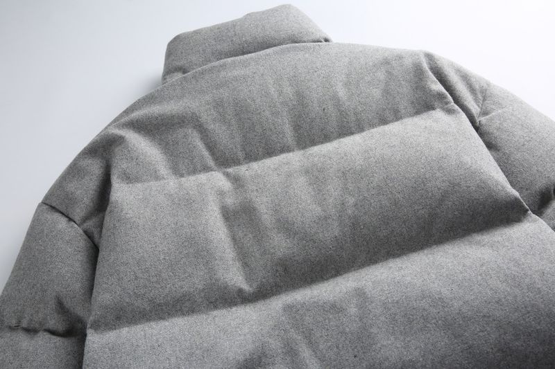 Piumino con collo alto, lungo cappotto in piuma con trama intrecciata a rombi per donna_voghion.com