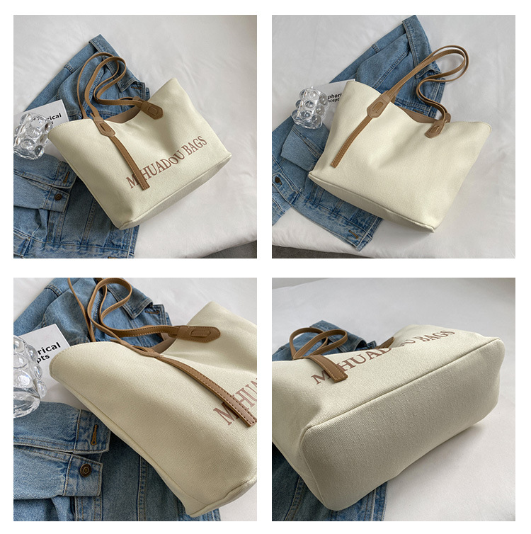Canvas Große Damen 2023 Neue Mode Pendler Umhängetasche Einfarbig Brief Stil Urban Einfache Einkaufstasche_voghion.com