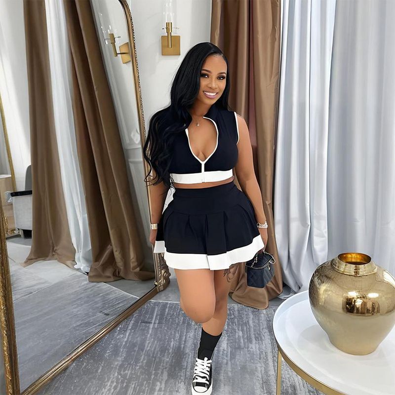 Roupas femininas novas, top sem mangas com zíper e saia curta_voghion.com