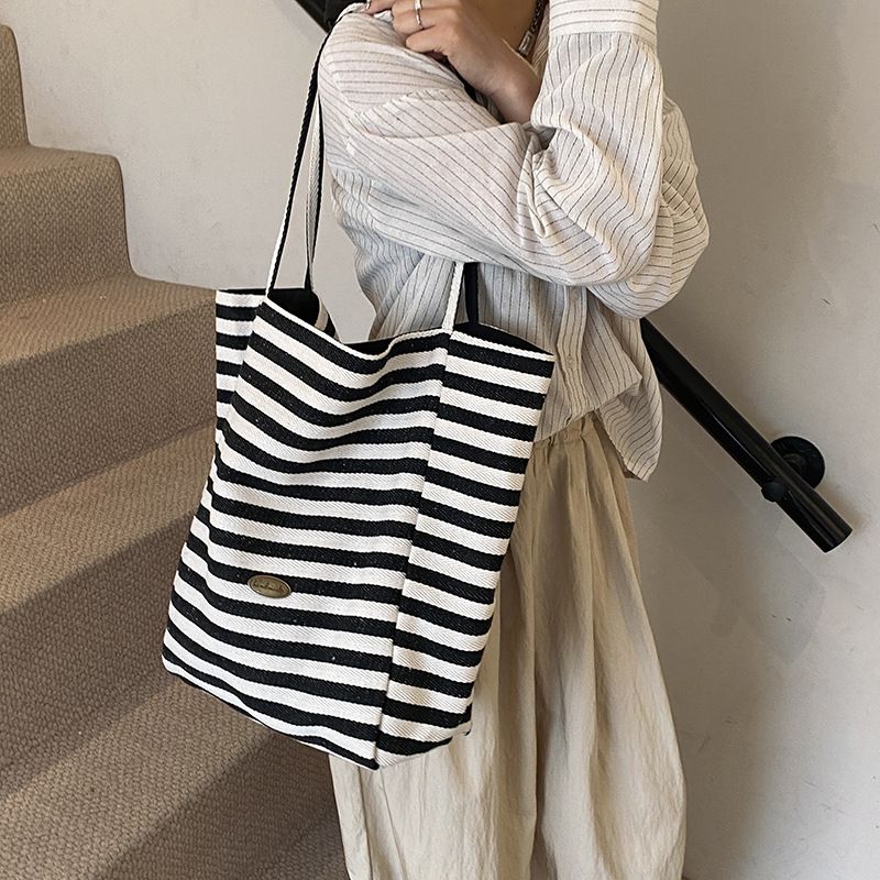 Borse a tracolla da donna: una borsa tote casual a righe con blocchi di colore, dallo stile dolce e rilassato, borsa a tracolla singola bifacciale_voghion.com