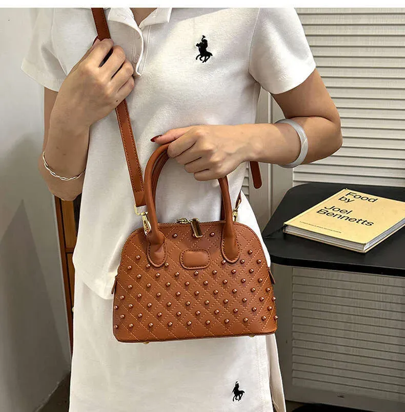 Fashion Designer Shell Bags For Women Elegant Rivet Handbag Versatile Large Capacity Shoulder Crossbody Bag_voghion.com