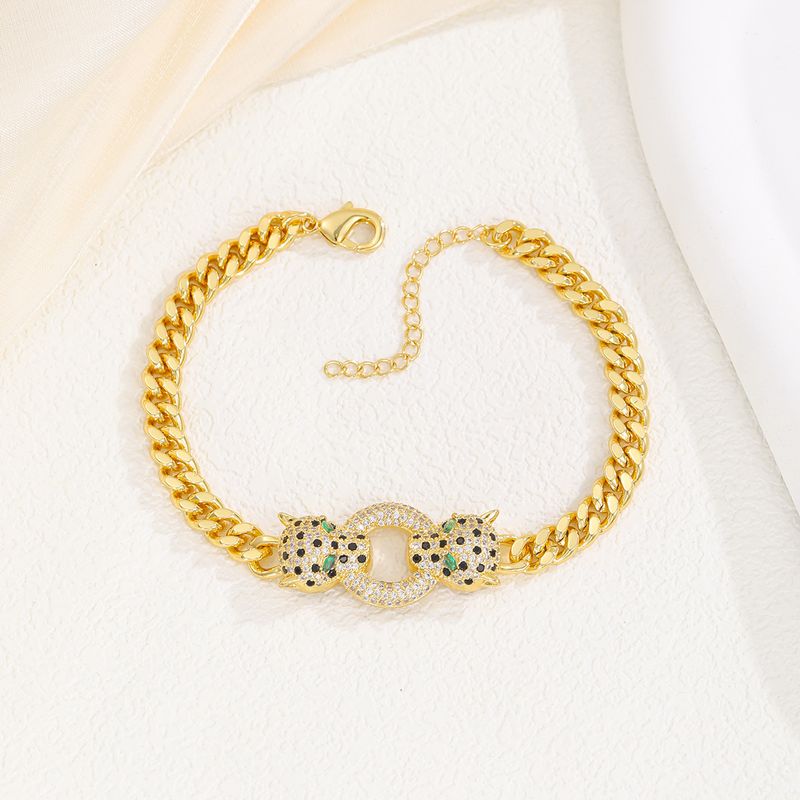 Bracciale da uomo e da donna in rame micro pavé di zirconi, placcato oro vero, stile punk hip hop, con doppia testa di leopardo_voghion.com