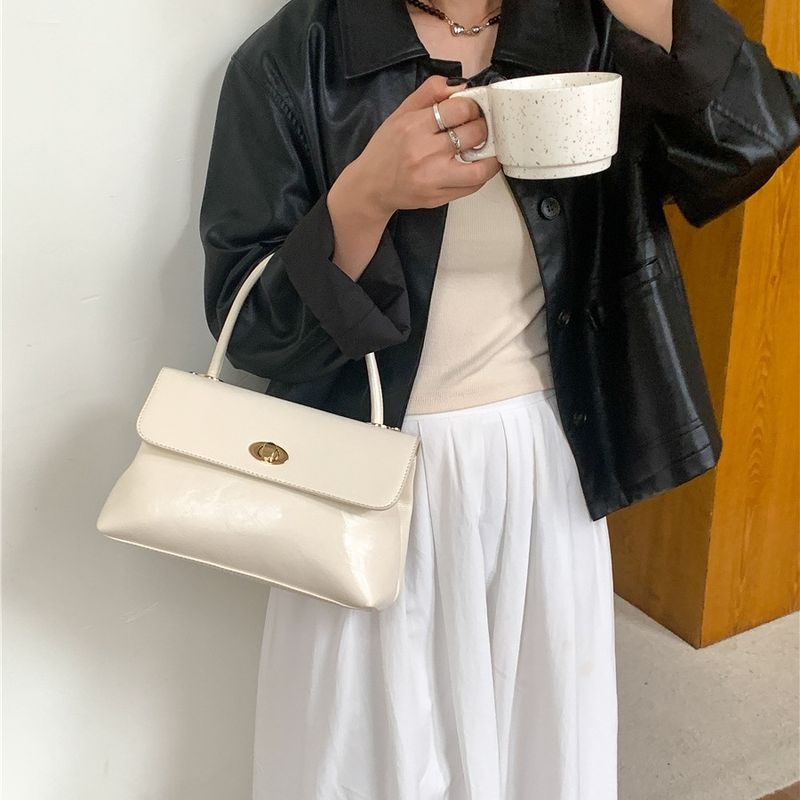 Borsa a tracolla con patta a forma di nicchia, moda di alta gamma, stile minimalista e compatto_voghion.com