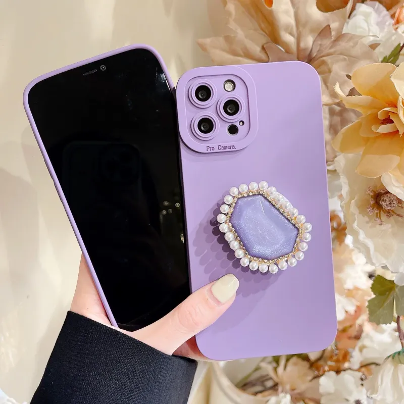 Oogpaarse edelsteen glitterhouder geschikt voor iPhone 15, 14, 12, 11, 13 Promax precisiegat volledig pakket telefoonhoesje_voghion.com