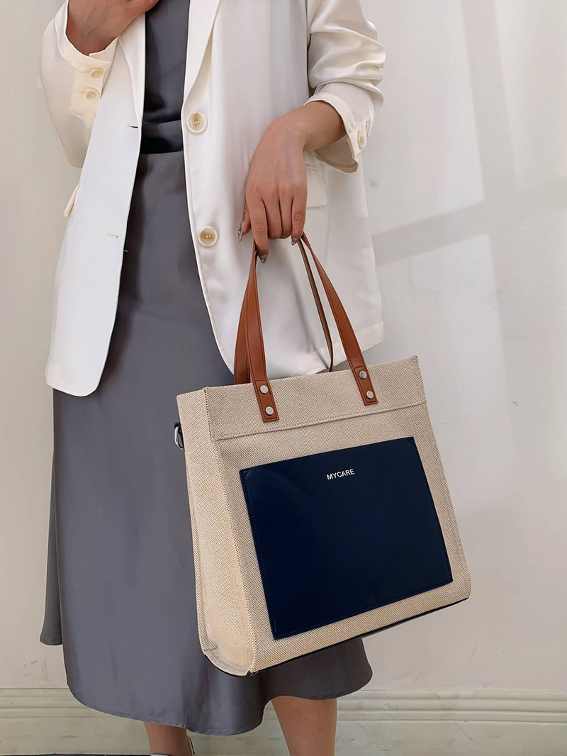 La spaziosa borsa da donna in tela è resistente, impermeabile e sigillata con cerniera, adatta per i pendolari, lo shopping, le uscite in spiaggia e l'uso quotidiano_voghion.com