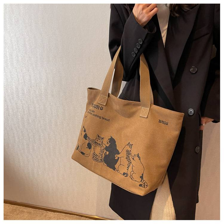 Mode canvas damestas Mode damesschoudertas Studentenklasse draagtas Denim materiaal Grote capaciteit damesboodschappentas_voghion.com