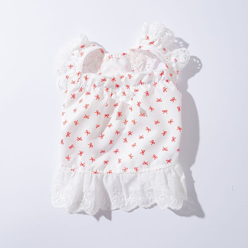Blauer, vollständig bedruckter Rand, dünner Hosenträgerrock mit Blumenmuster für Welpen im Frühling und Sommer im Vergleich zur Hundekleidung mit Teddybär_voghion.com