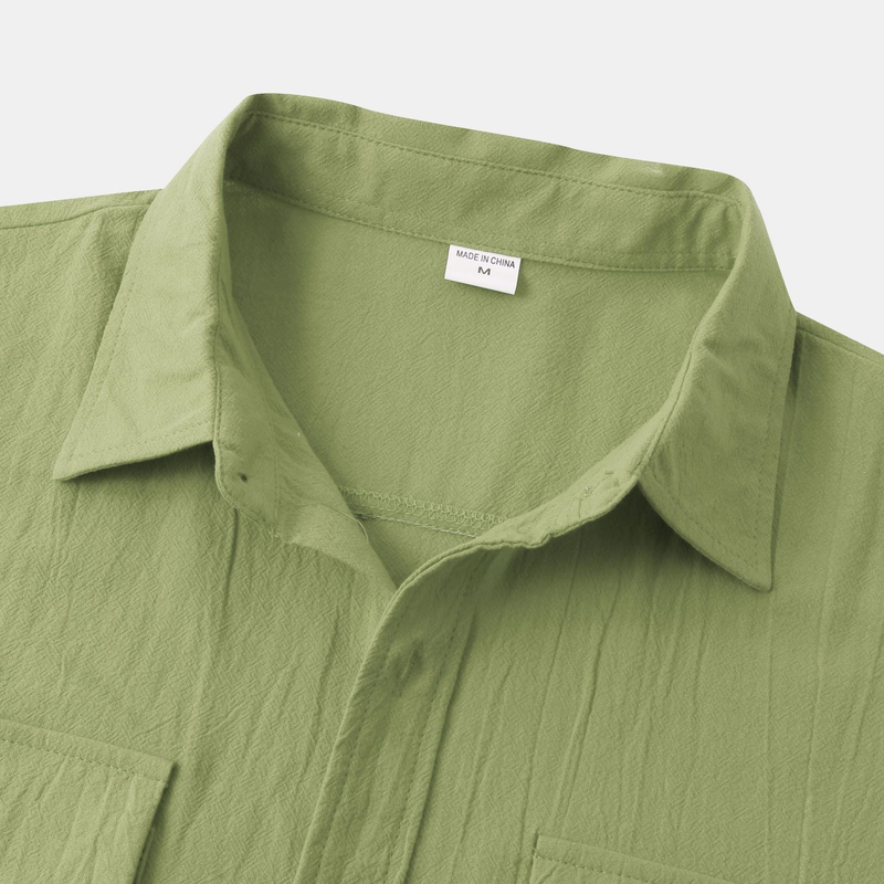Camicia a maniche corte casual alla moda di grandi dimensioni in lino di cotone sciolto tinta unita estate 2023 dei nuovi uomini_voghion.com