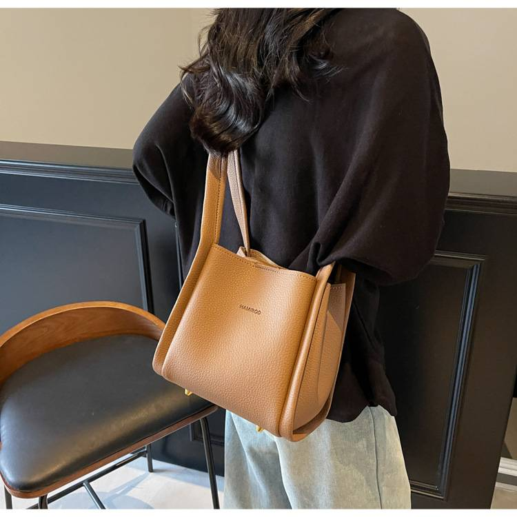 Zweiteilige, weiche Schultertasche mit Litschi-Muster für Mütter im Außenhandel. Neue, lässige, einfache, tragbare diagonale Tasche für das Leben._voghion.com