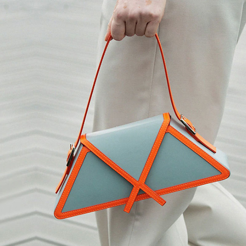 New niche design with high-end touch, trapezoidal contrasting color splicing, small square bag, handle, and women's bag_voghion.com