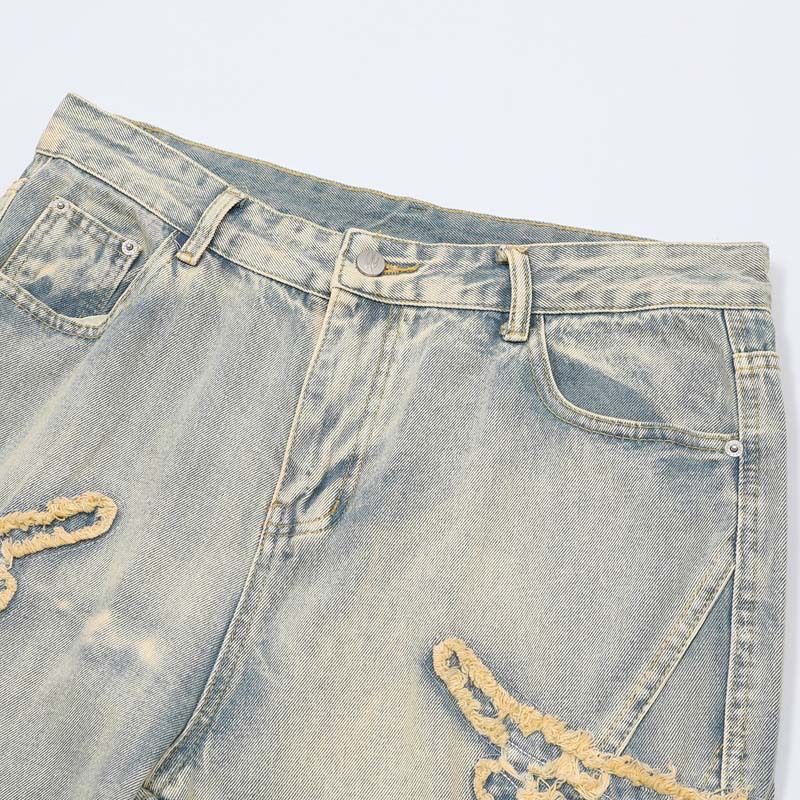 Herrkläder denim applikationer broderi rå kant tvättade distressed jeans herr high street retro byxor med vida ben_voghion.com