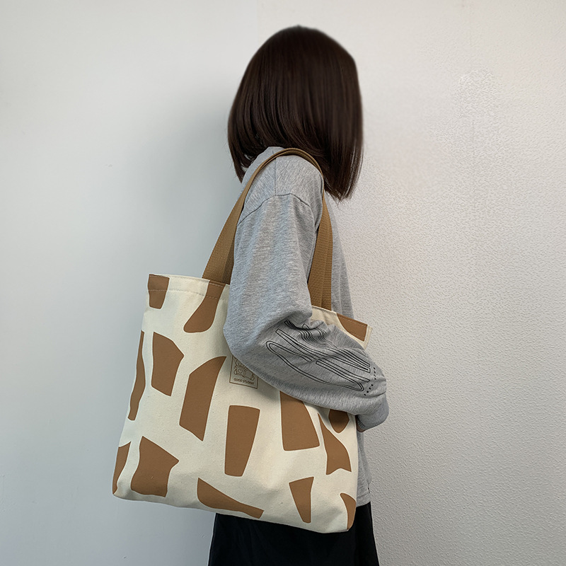 Tela da donna monospalla per lezione, outfit da studentessa universitaria, stile coreano Instagram con cerniera, design artistico,_voghion.com