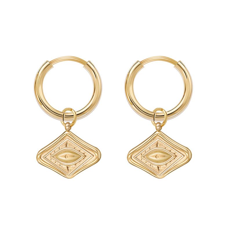 Serie Devil's Eye de acero inoxidable: una sensación elegante y fresca, y aretes versátiles para desplazamientos diarios._voghion.com