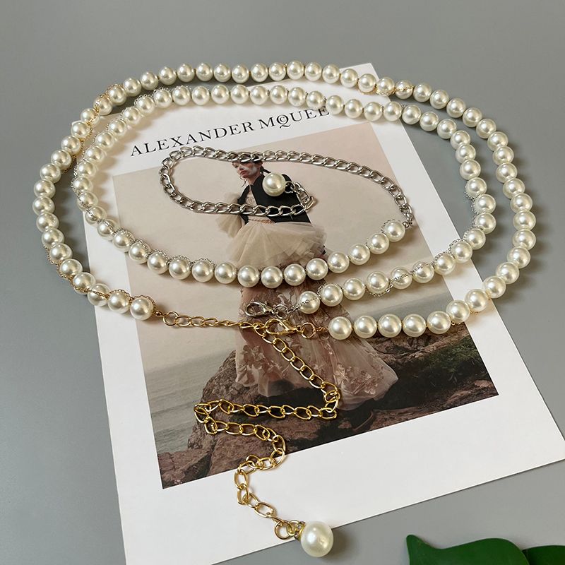 Nuova catena in vita sottile per donna fatta a mano con perla bianca con cintura dolce in maglione con catena in metallo_voghion.com