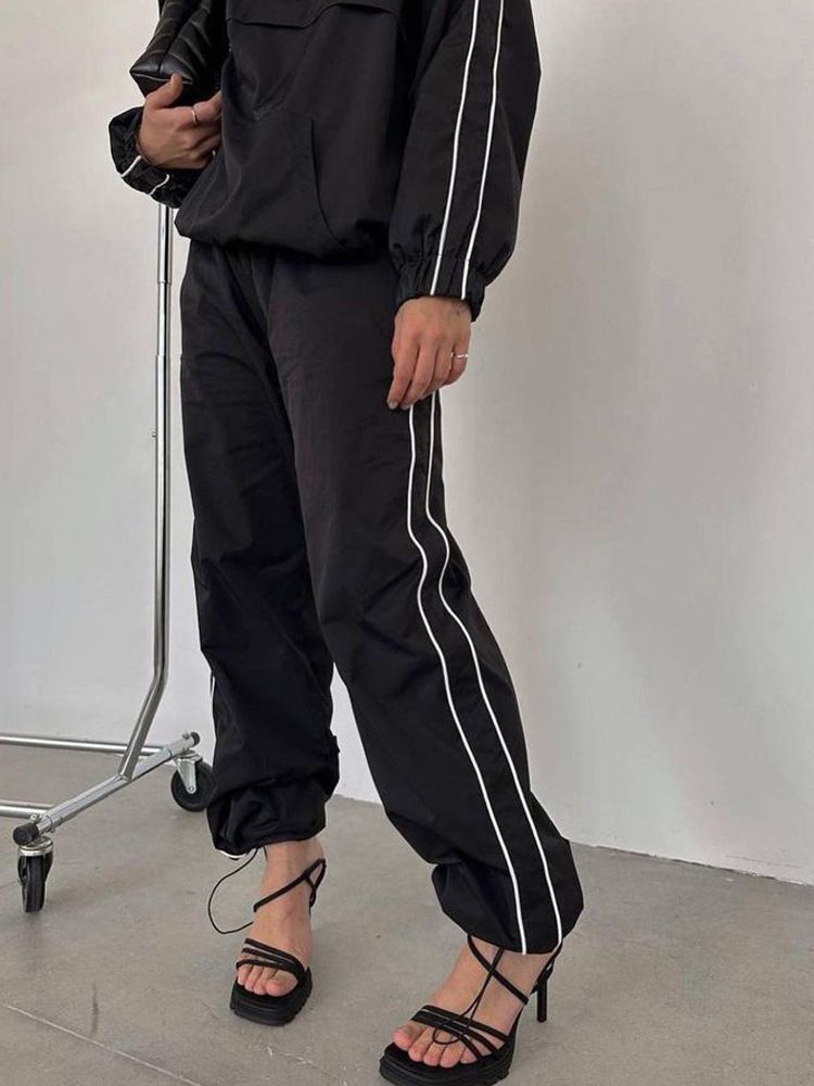 Felpa con maniche a righe alla moda da donna e set casual con cerniera e pantaloni lunghi per le donne_voghion.com