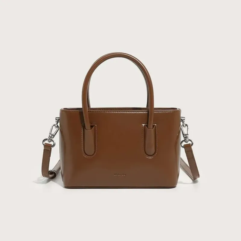 Bolso mini horizontal de diseño avanzado de diseñador 2025 para mujer, informal y versátil, con un solo hombro y cierre bajo el brazo._voghion.com
