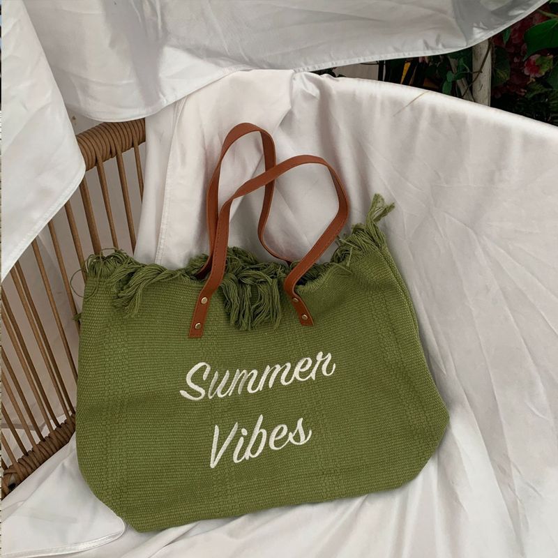 Borsa a mano in stile coreano, nuova, versatile, in tela, ricamata, con nappa, da donna, in tessuto, da spiaggia_voghion.com