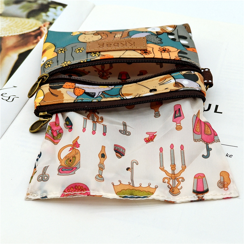 new printed and coated cartoon wallet, anti fouling and waterproof lipstick coin storage bag, women's canvas wallet_voghion.com