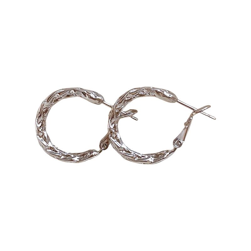 Orecchini a cerchio intrecciati in metallo color argento, stile minimalista, versatili, eleganti e alla moda, leggeri, di lusso, di alta gamma_voghion.com