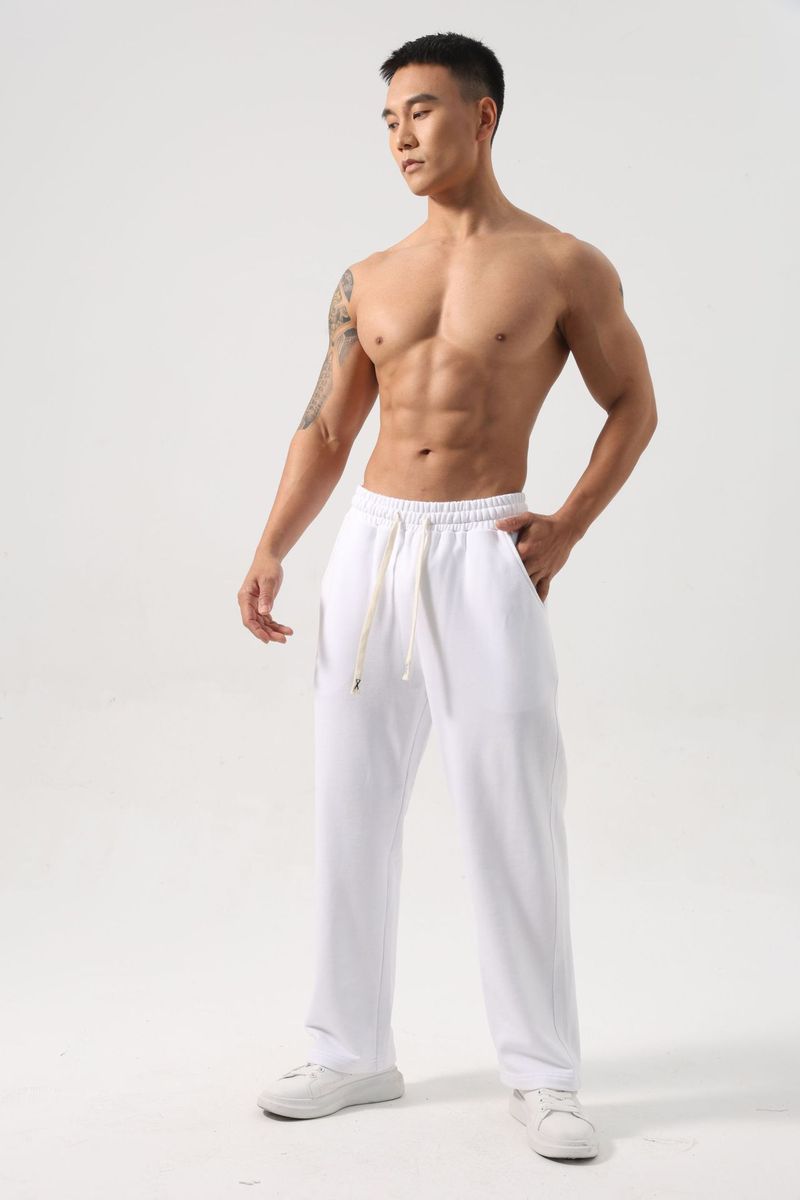 Herren- und Damen-Jogginghose aus schwerer Baumwolle mit lockerer Passform für Fitnessstudio, Training und Freizeit. Hochwertiges, weiches Fleecefutter. Feuchtigkeitsableitend. Mehrere Größen._voghion.com