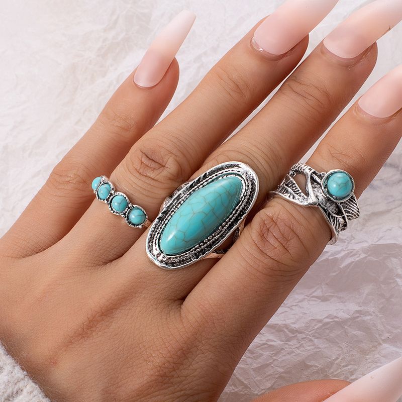 Nuovo set di 3 anelli con piume bohémien e turchese grandi_voghion.com