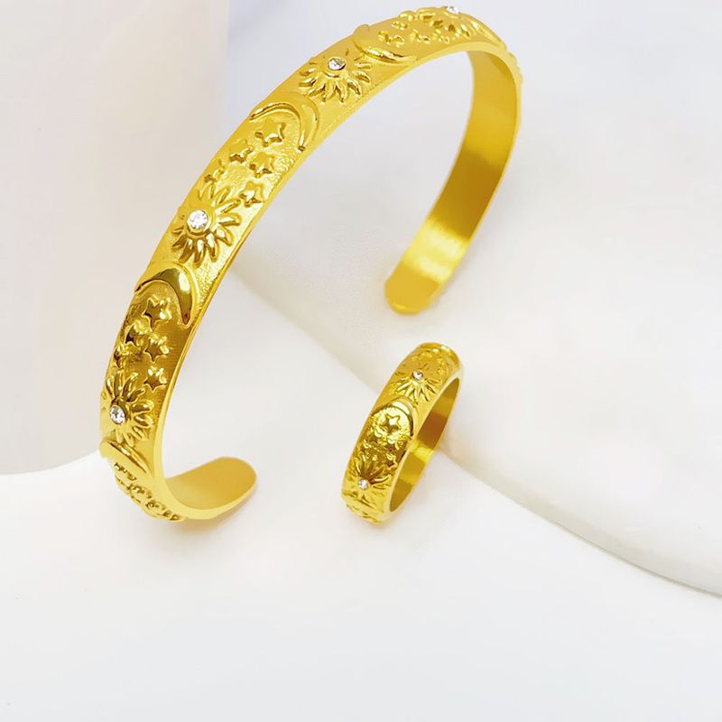 Set di gioielli da donna con anello e bracciale in acciaio al titanio con incisione Sole e Luna, design geometrico, ipoallergenico, dichiarazione di moda per l'uso quotidiano_voghion.com