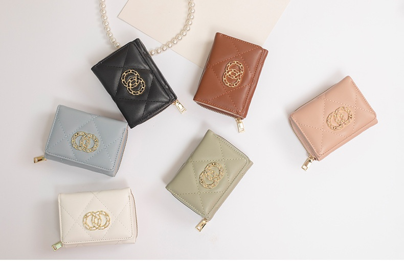 Portafoglio da donna Xiaoxiangfeng di vendita caldo Portafoglio corto a tre strati Ragazza Zero Portafoglio multi-carta Borsa con cerniera Borsa portatile Fermasoldi_voghion.com