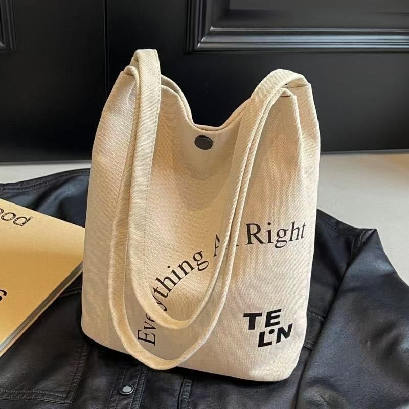 Canvas Shoulder For Women 2025 Spring Summer New Commuter Underarm Bucket Large Capacity Tote Bag_voghion.com