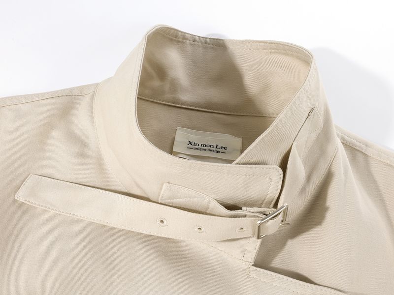 XinmonLee Vroege Herfst Nieuwe Lange Trenchcoat High-End Elegante Koreaanse Stijl Losse Casual Opstaande Kraag Jas_voghion.com