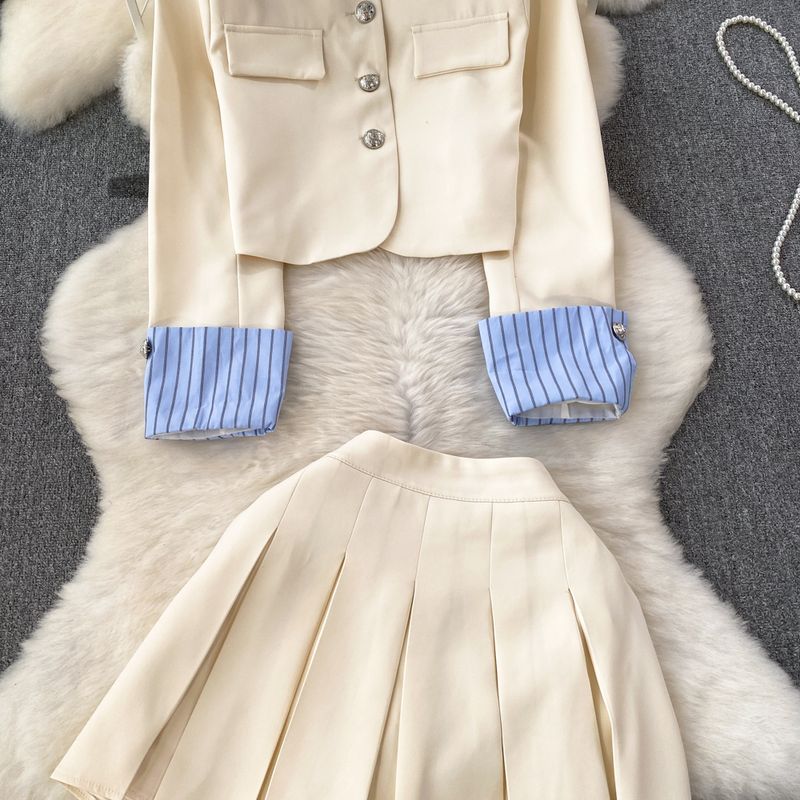 Damenbekleidung Modischer Anzug für Damen, damenhaftes Temperament, gestreifte Anzugjacke mit Spleiß, zweiteiliger Anzug, A-Linien-Rock mit hoher Taille_voghion.com