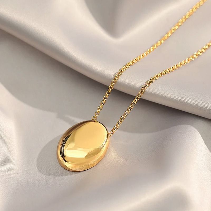 2025 Women Fashion Brand new matte metal oval pendant, geometric long women's sweater luxurious and charming fine necklace, artificial_voghion.com