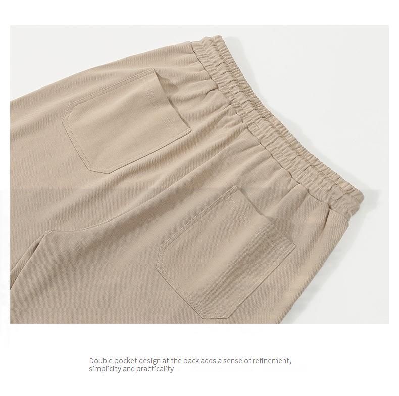 Spodnie dresowe unisex z elastycznego materiału twill z troczkami w pasie – wygodny, luźny krój dla mężczyzn i kobiet (czarny, khaki, ciemnoszary, głęboki beż)_voghion.com