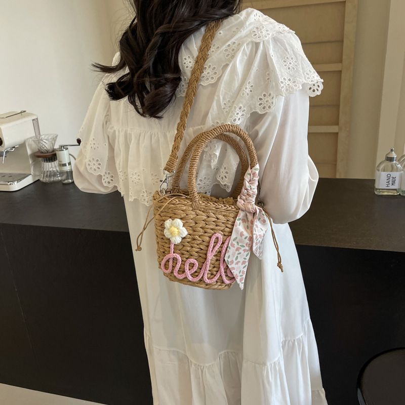 Borsa a secchiello intrecciata a mano per donna, borsa a tracolla singola, casual, in paglia, nuova moda primavera estate 2024_voghion.com