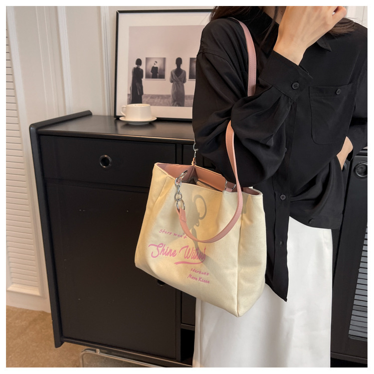 03 New Canvas Girls' Chain Advanced Sense Trend Portable Tote Bag Commuting Simple and Large Capacity_voghion.com