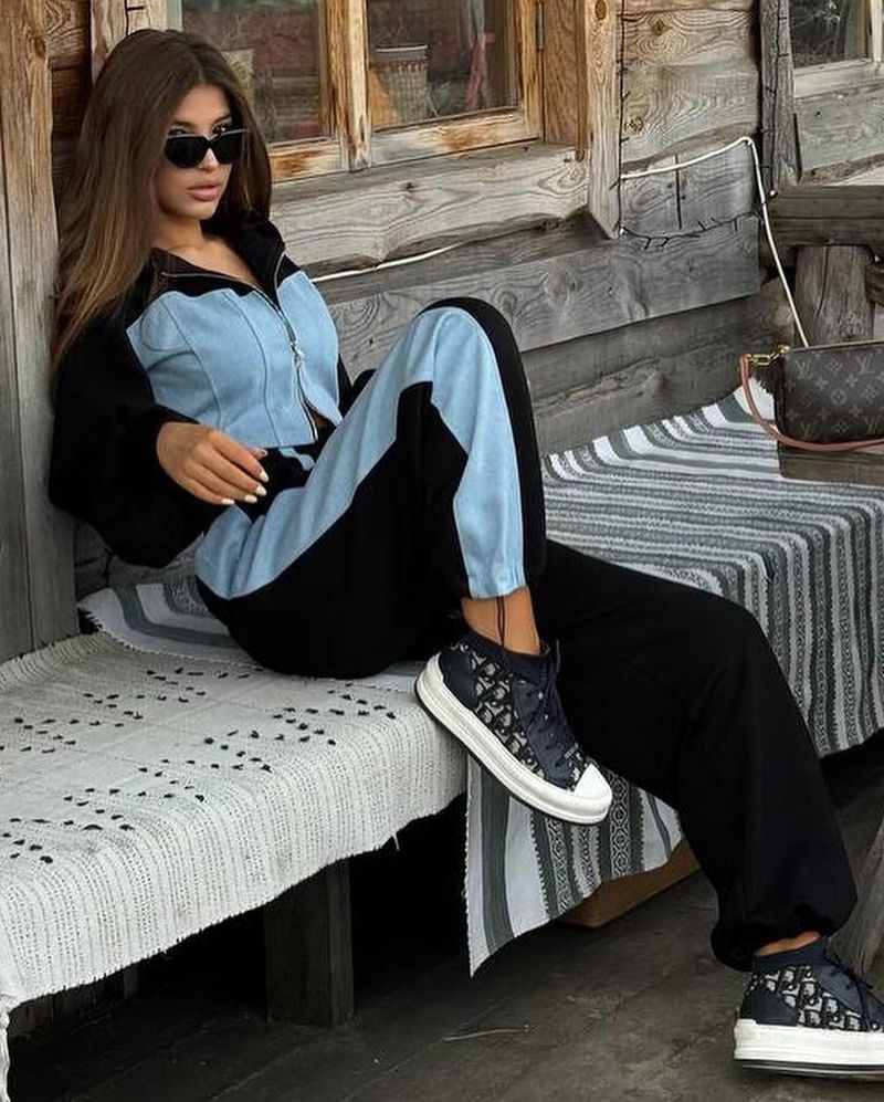 2025 Europäischer und amerikanischer Stil, lässiger Kapuzenpullover, Denim-Spleißen, Kapuzenoberteil, lange Hose, zweiteiliges Set, Damen_voghion.com