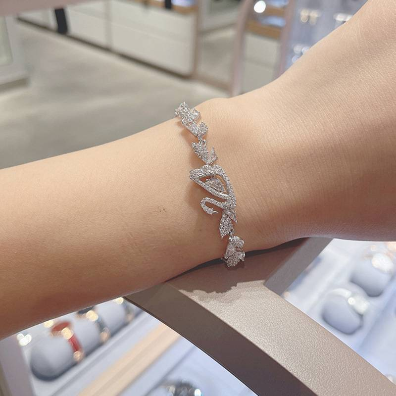 Bracciale con bottone a forma di cigno con cuore che salta. Bracciale spirituale in cristallo con oca da 1 pezzo per donna_voghion.com