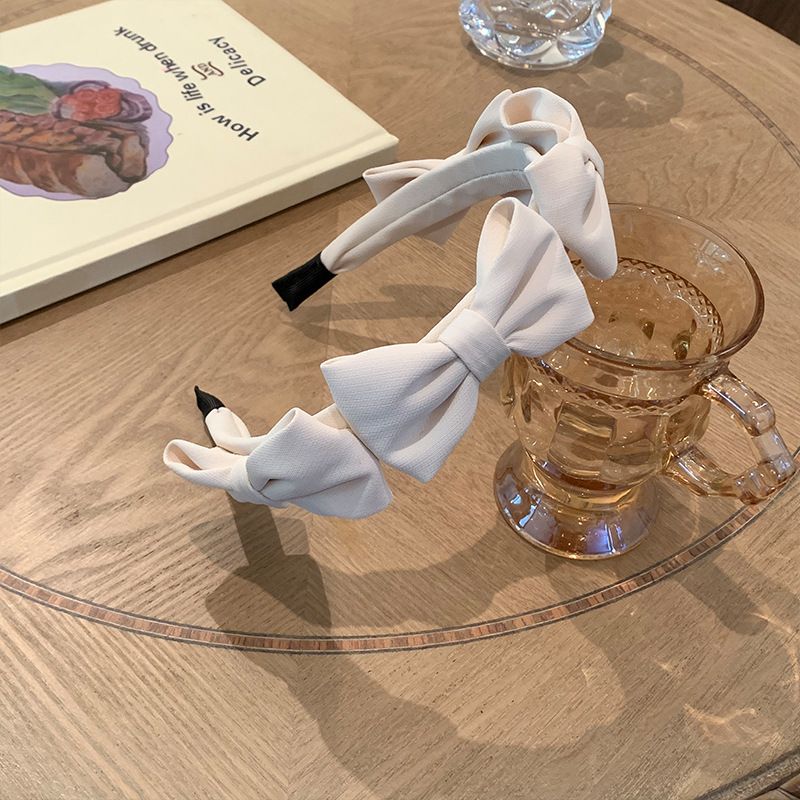 Fascia per capelli con fiocco primaverile da donna 2022 Internet Celebrity New High Cranial Top High Sense All-match Going Out_voghion.com